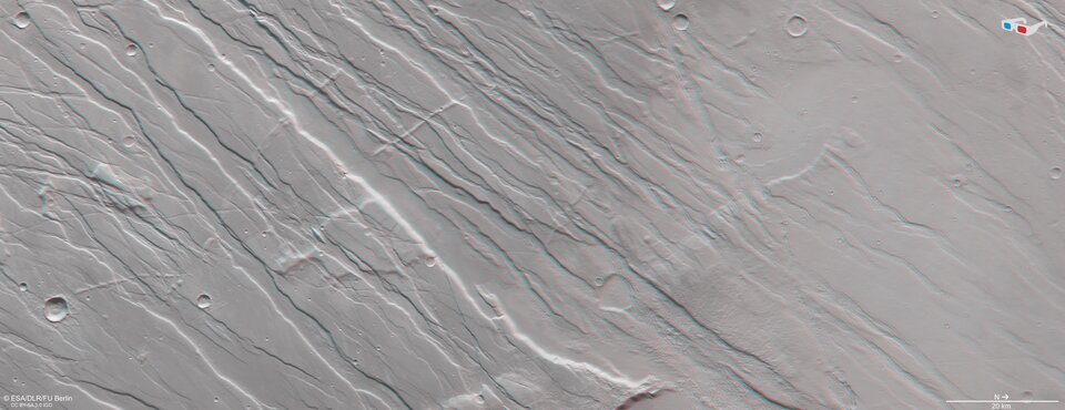 Use red-green or red-blue glasses to view Tempe Fossae in 3D