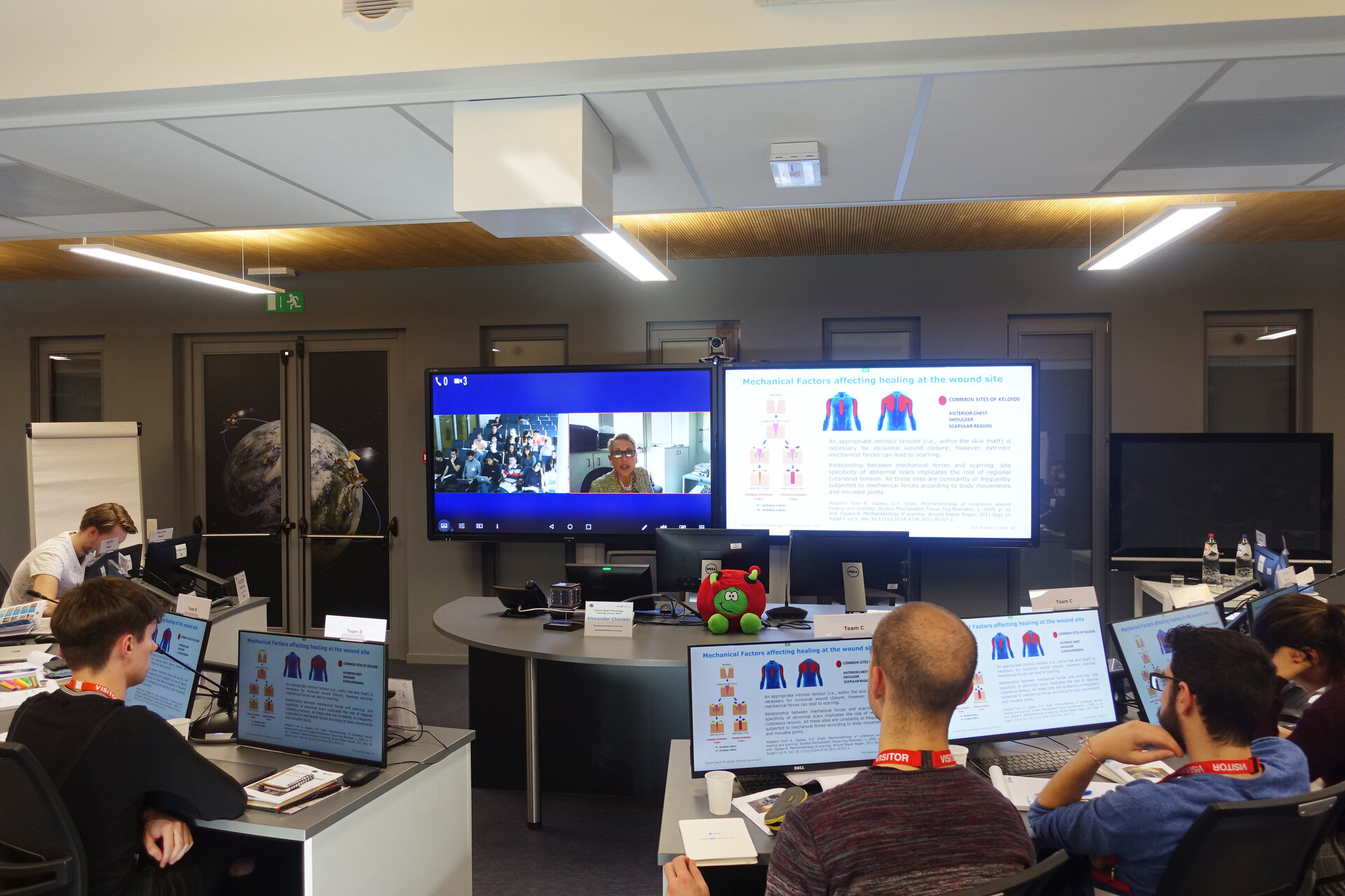 Students following a lecture via videoconference