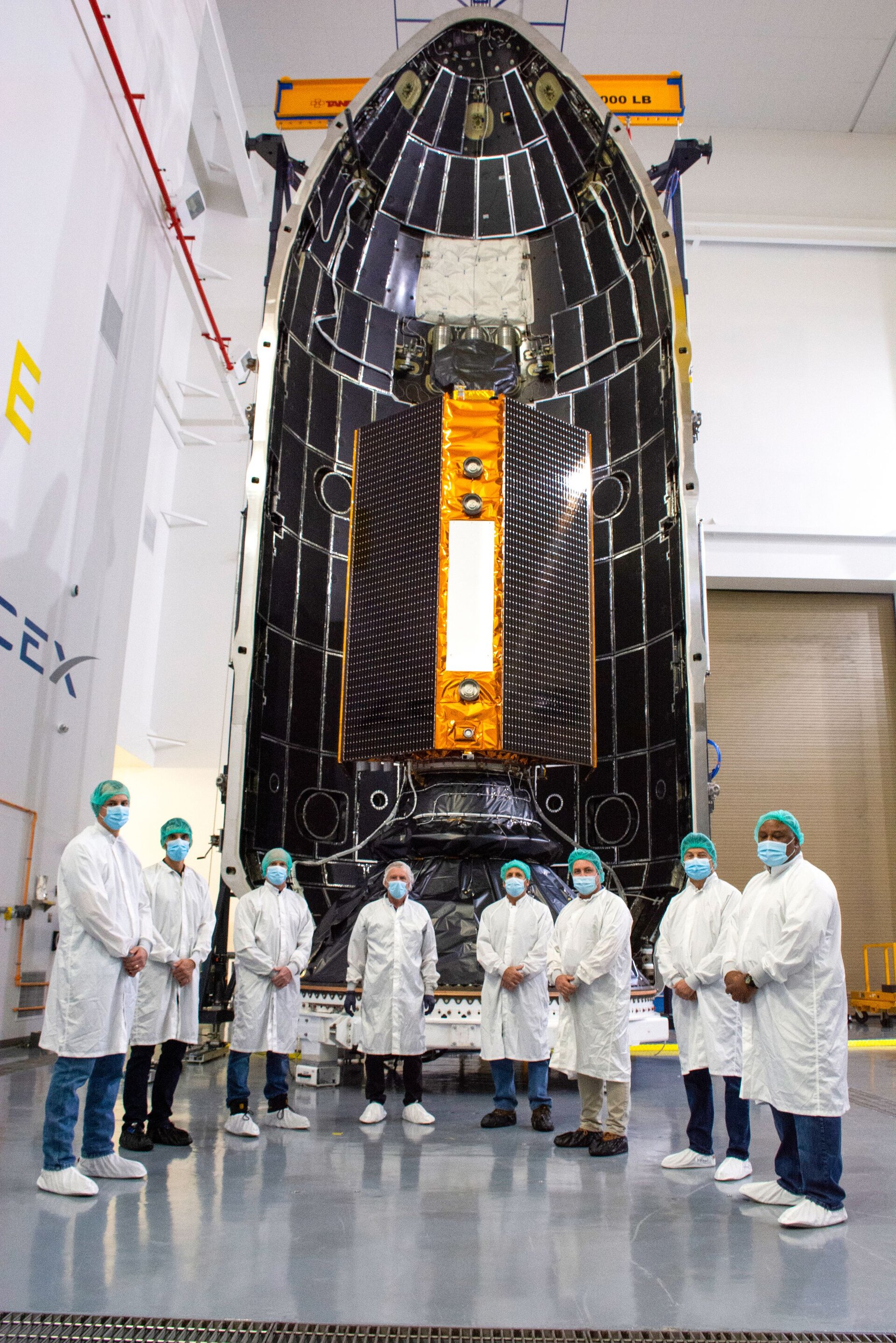 The launch campaign team in front of the satellite