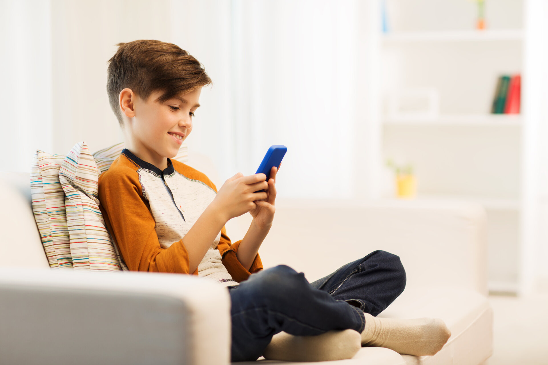 Young person playing on gaming app