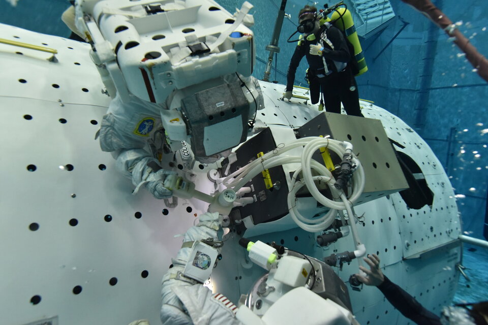 The astronauts trained for the installation at NASA’s Neutral Buoyancy Laboratory