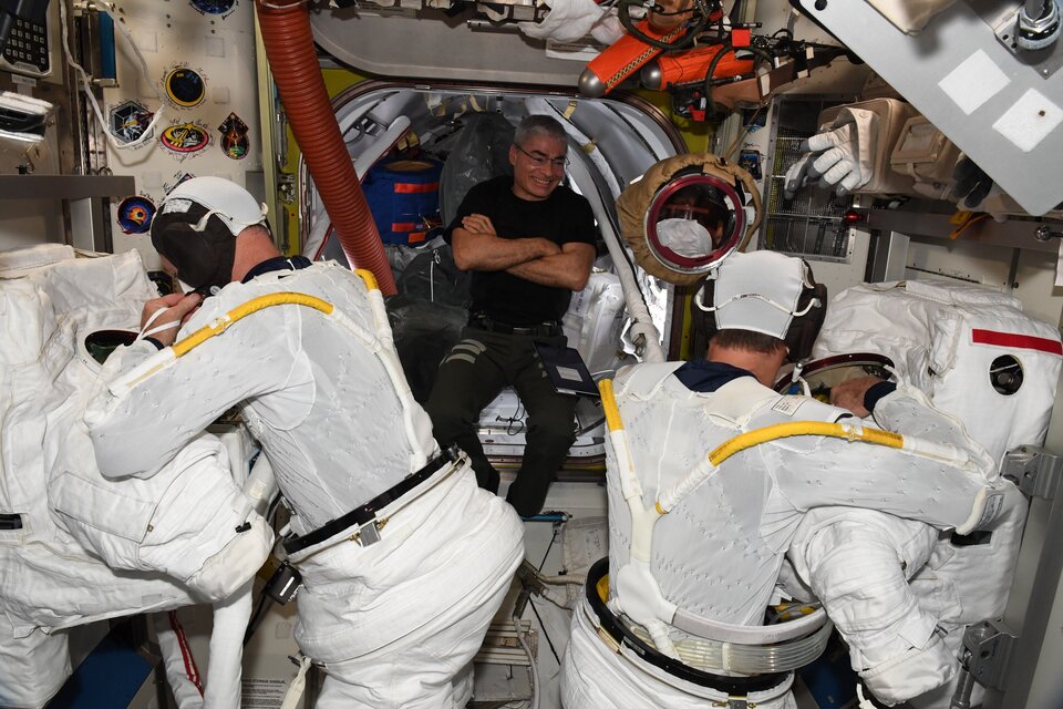 ESA astronaut Thomas Pesquet checks his spacesuit ahead of a spacewalk