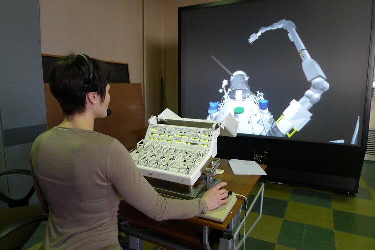 Samantha Cristoforetti trains with the European Robotic Arm