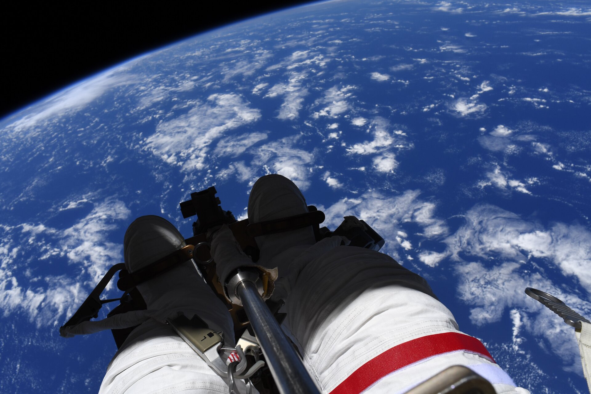 ESA astronaut Thomas Pesquet overlooking Earth during a spacewalk