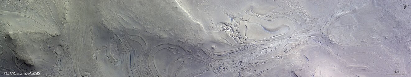 Swirling deposits in a giant impact basin