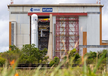 Webb's Ariane 5 launch vehicle exits the launch vehicle integration building at Europe's Spaceport