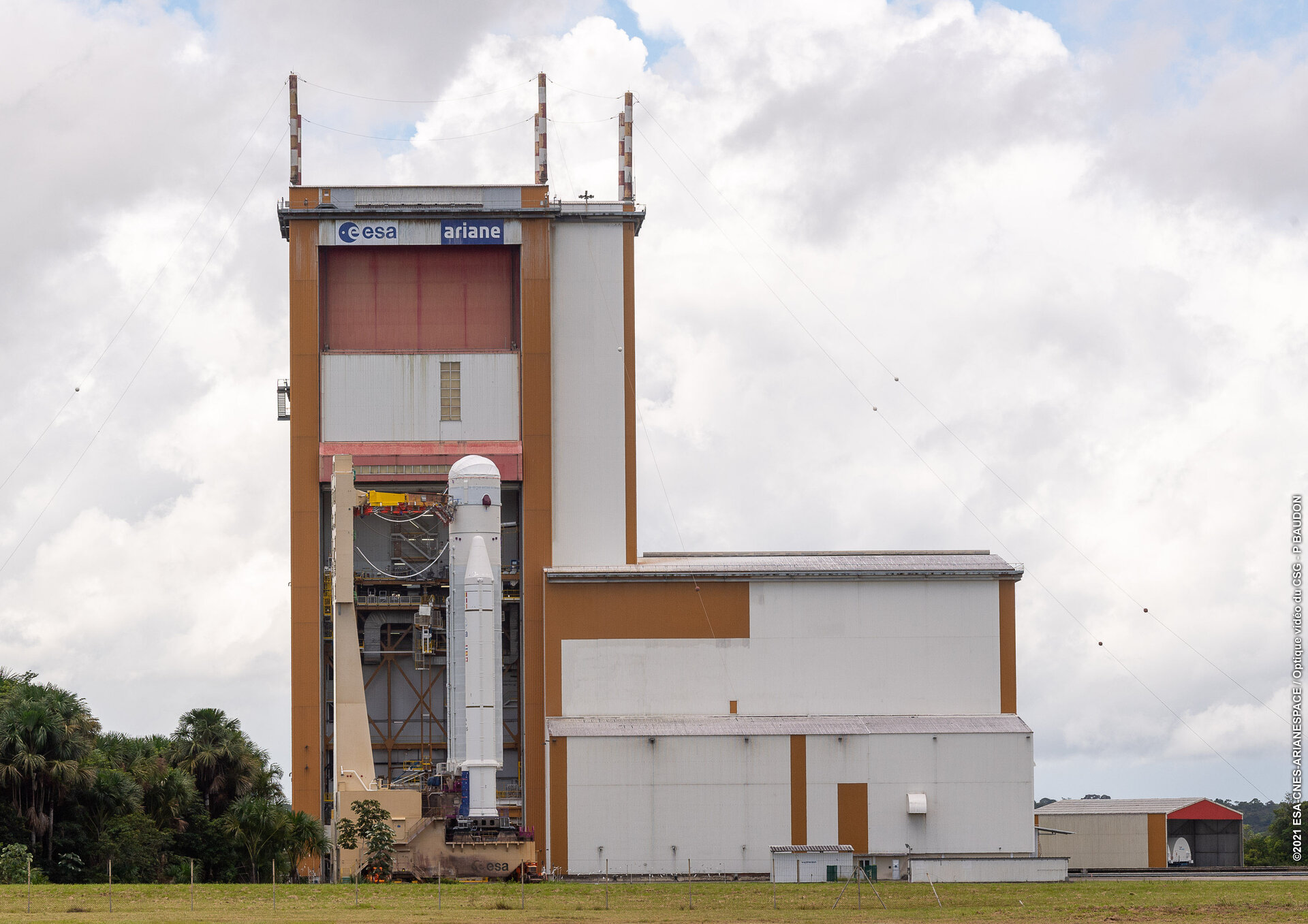 Webb's Ariane 5 launch vehicle arrives at the final assembly building at Europe's Spaceport