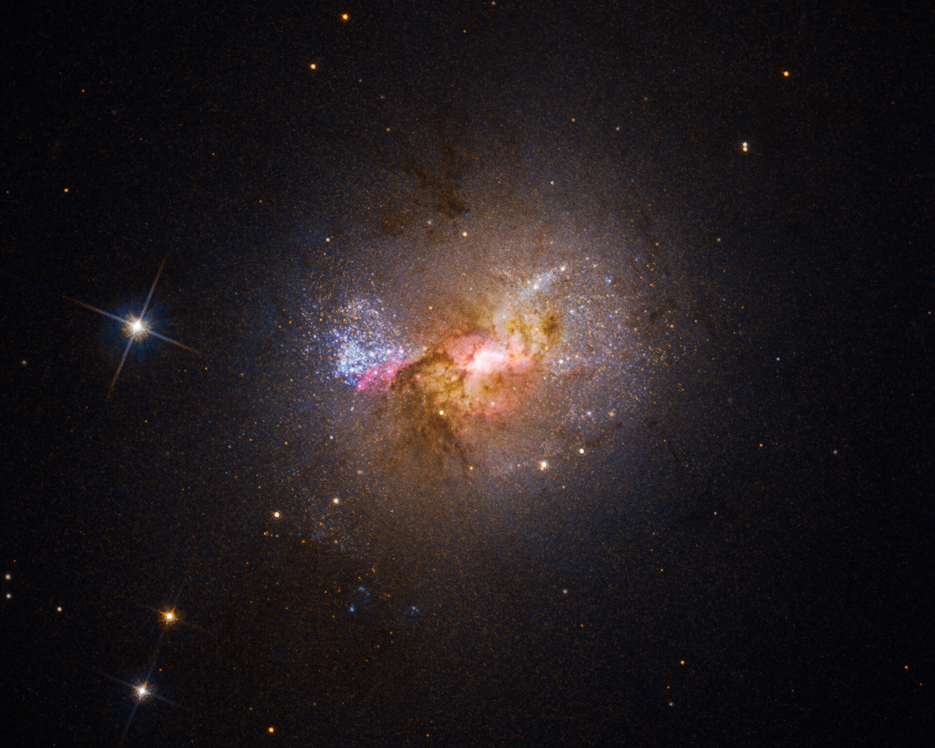 Hubble finds a black hole igniting star formation in a dwarf galaxy