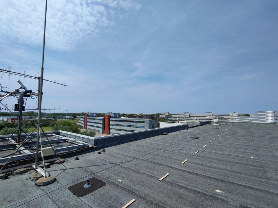 Top of the Erasmus building to fix an antenna. Credit: Hasse Hansen