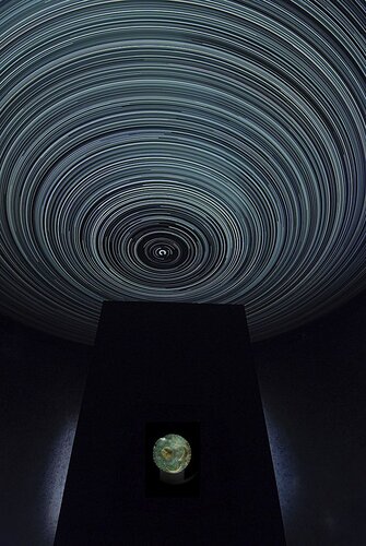 Photo of the Sky Disc in its showcase during the permanent exhibition of the State Museum of Prehistory in Halle, Germany.