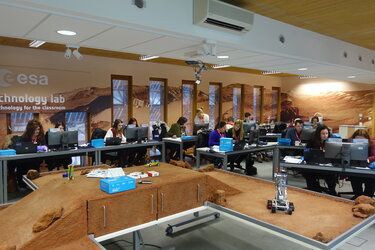 A general view of the e-technology lab and Primary School Teachers programming Astro Pi microcomputers.