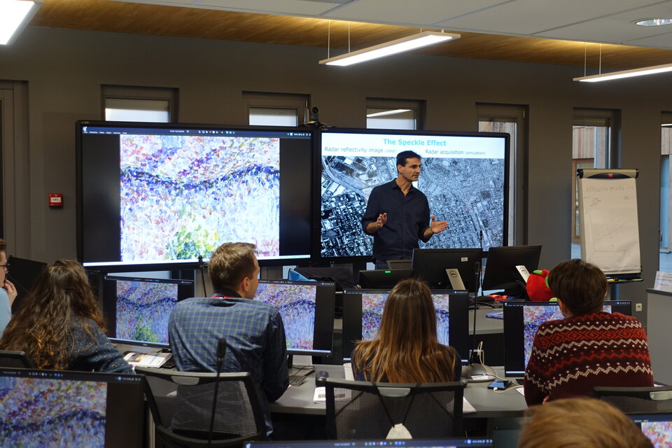 Expert is delivering the Remote Sensing Data Fusion lecture to university students
