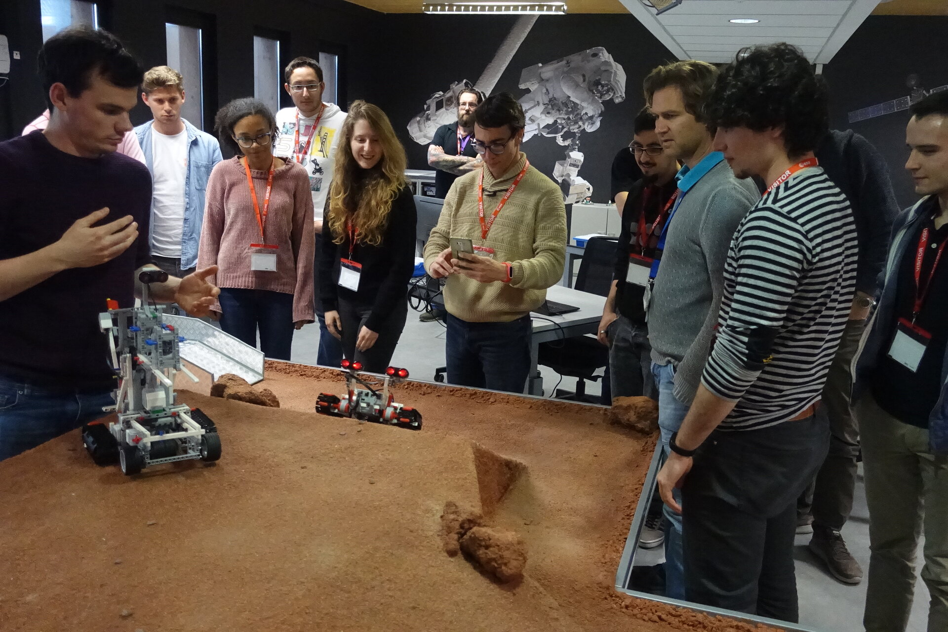 University students exploring model rovers at ESA Education's E-Technology Lab
