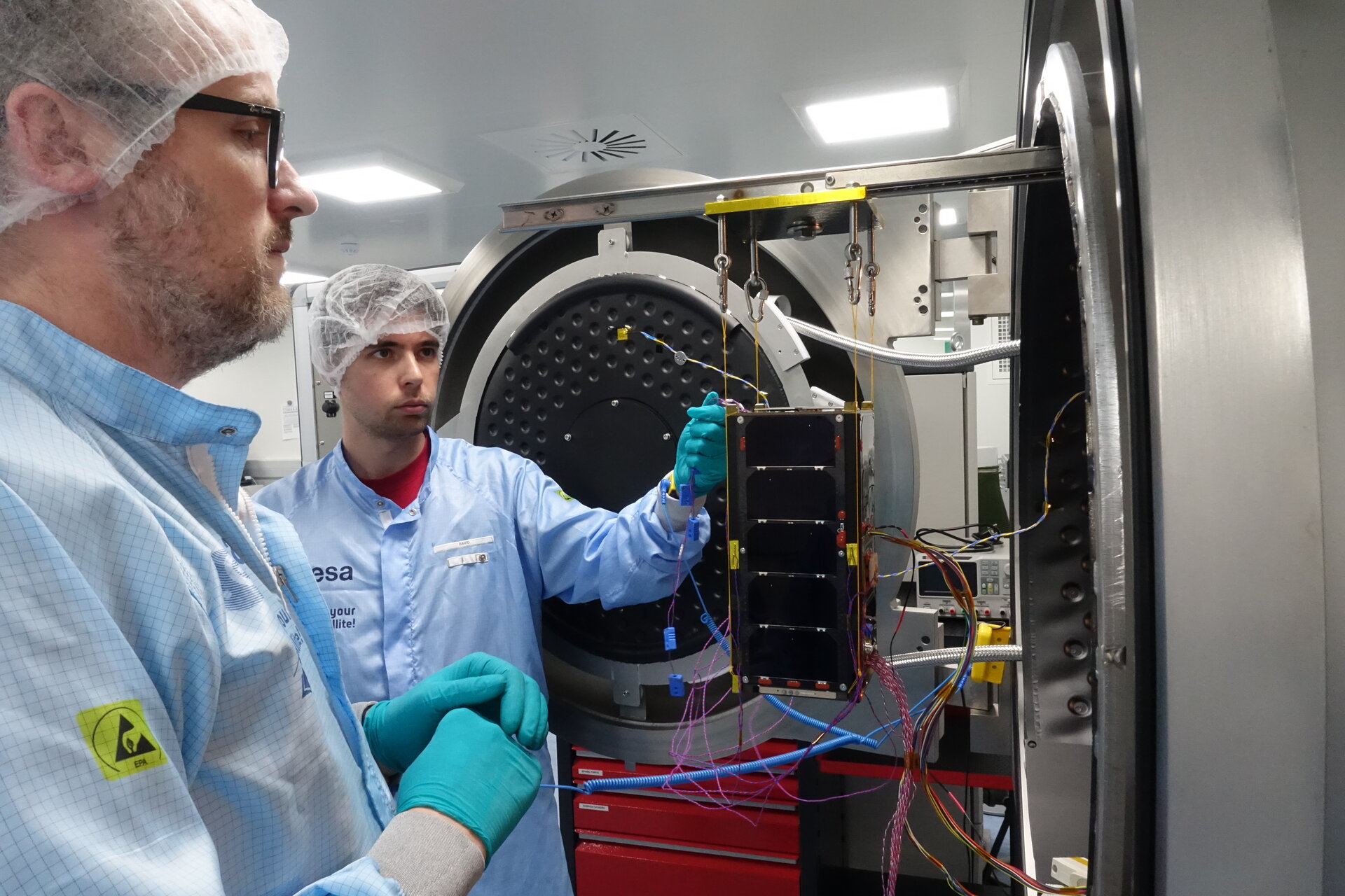 Final checks before the satellite went into the TVAC chamber/ EIRSAT-1 being prepared for the TVAC chamber