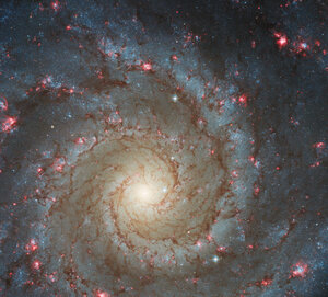 Hubble gazes into M74