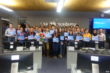 Student group picture with certificates of participation during pilot edition