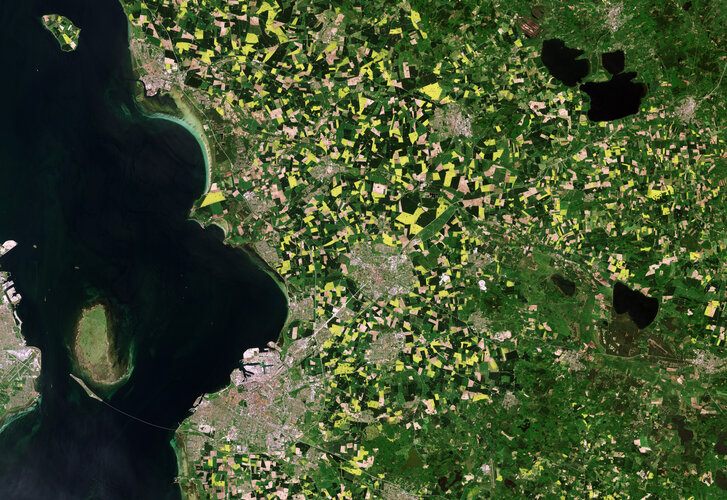Agricultural fields that surround the cities of Lund and Malmö in Sweden are pictured in this image, captured by the Copernicus Sentinel-2 mission.