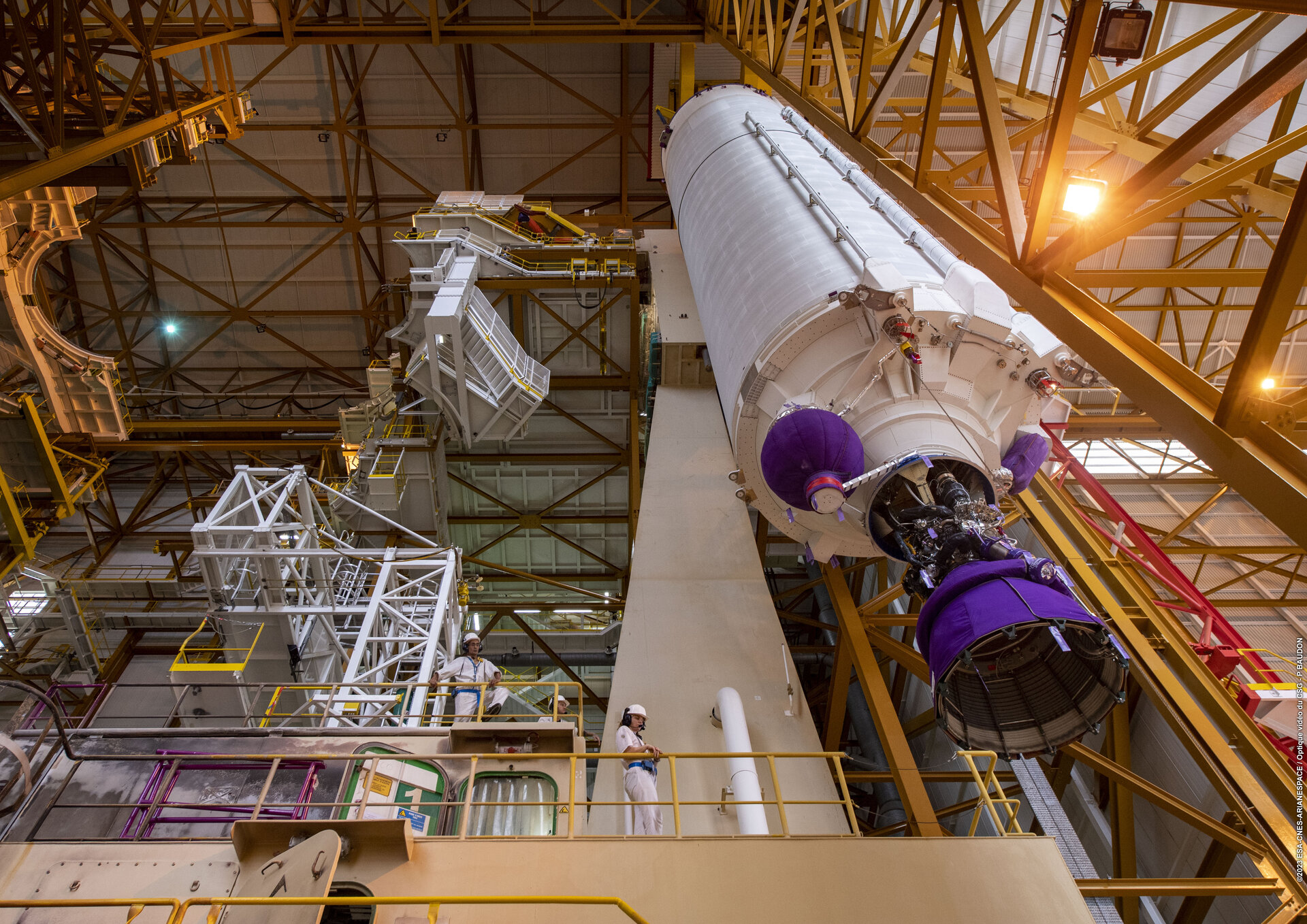 Part of an Ariane 5 launcher in a large warehouse