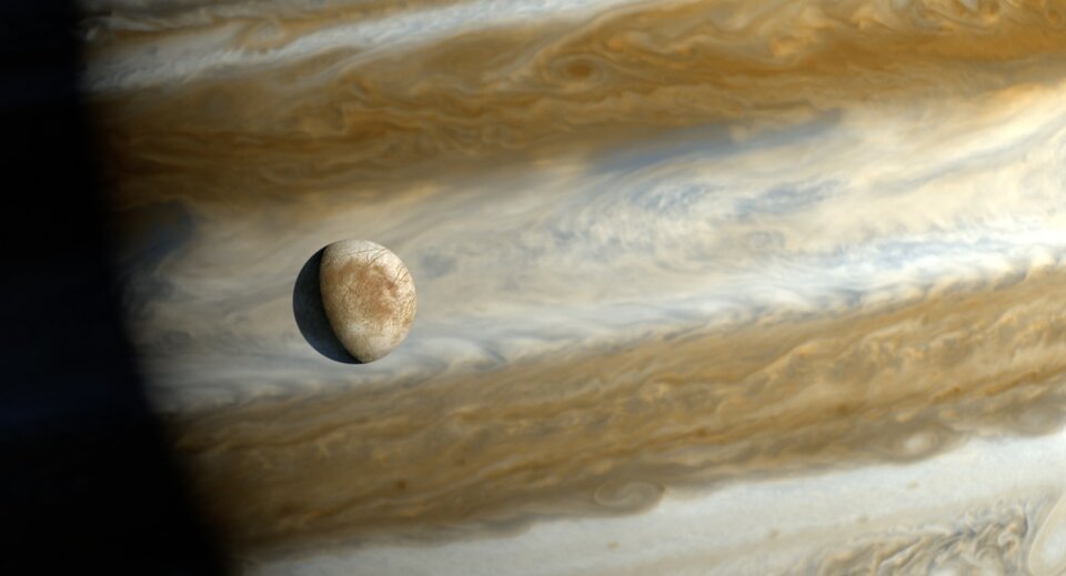 Artist's impression of Europa orbiting Jupiter
