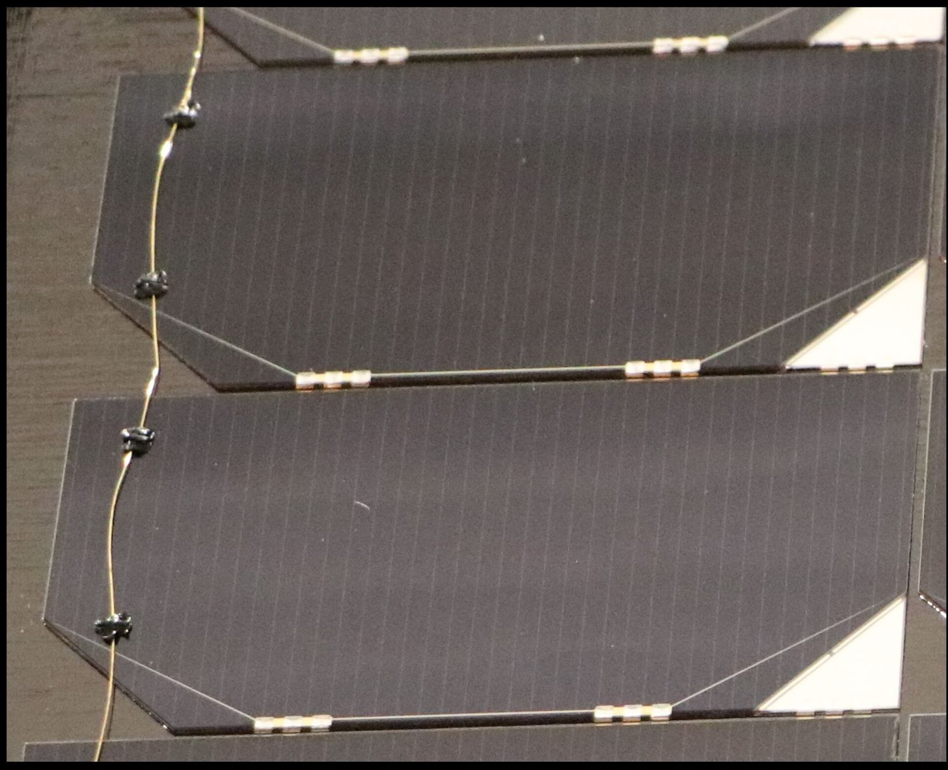 Juice solar cells with cover glass and grounding network of tiny wires
