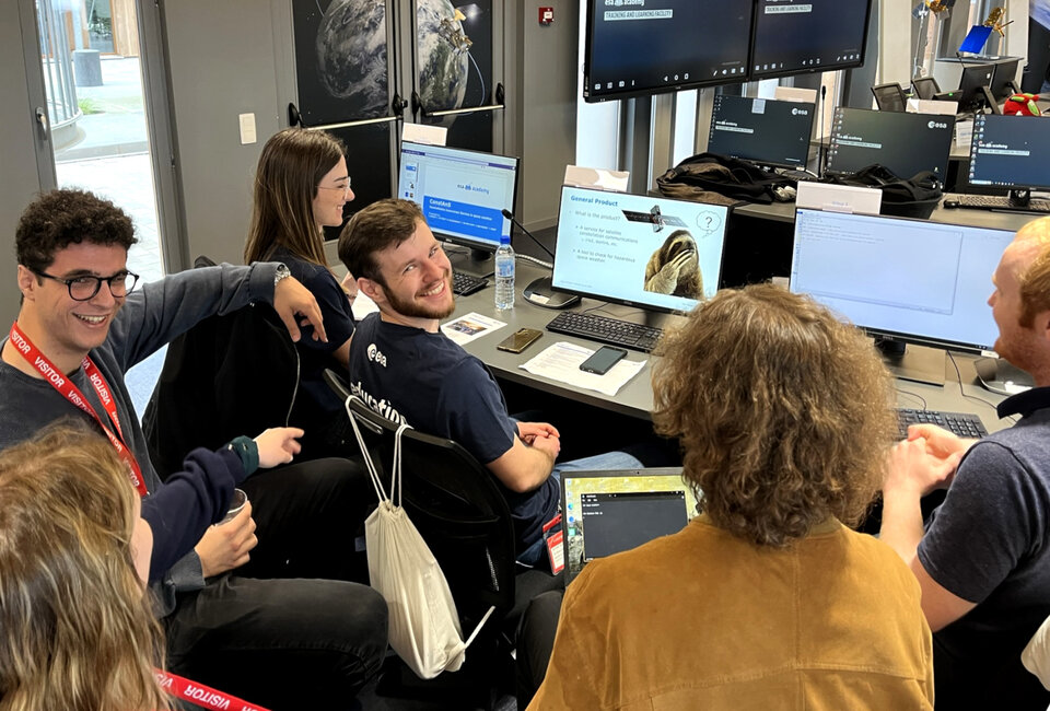 Group of students designing a Space Weather service