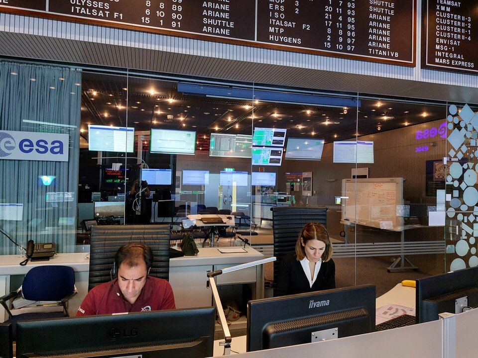 Filipe Metelo and Isabel Rojo during Aeolus reentry simulations. Simulation Officer Filipe says "for the teams, these simulations feel like the real thing"