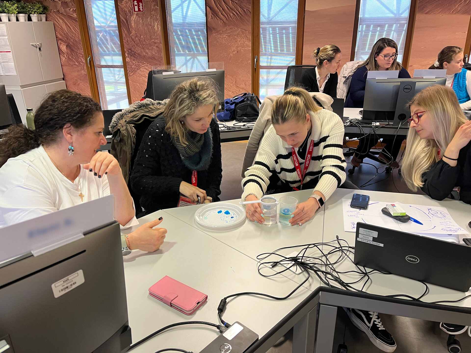 How do surface ocean currents flow? Teachers perform a experiment to visualize this phenomenon during the "Teach with Earth" workshop
