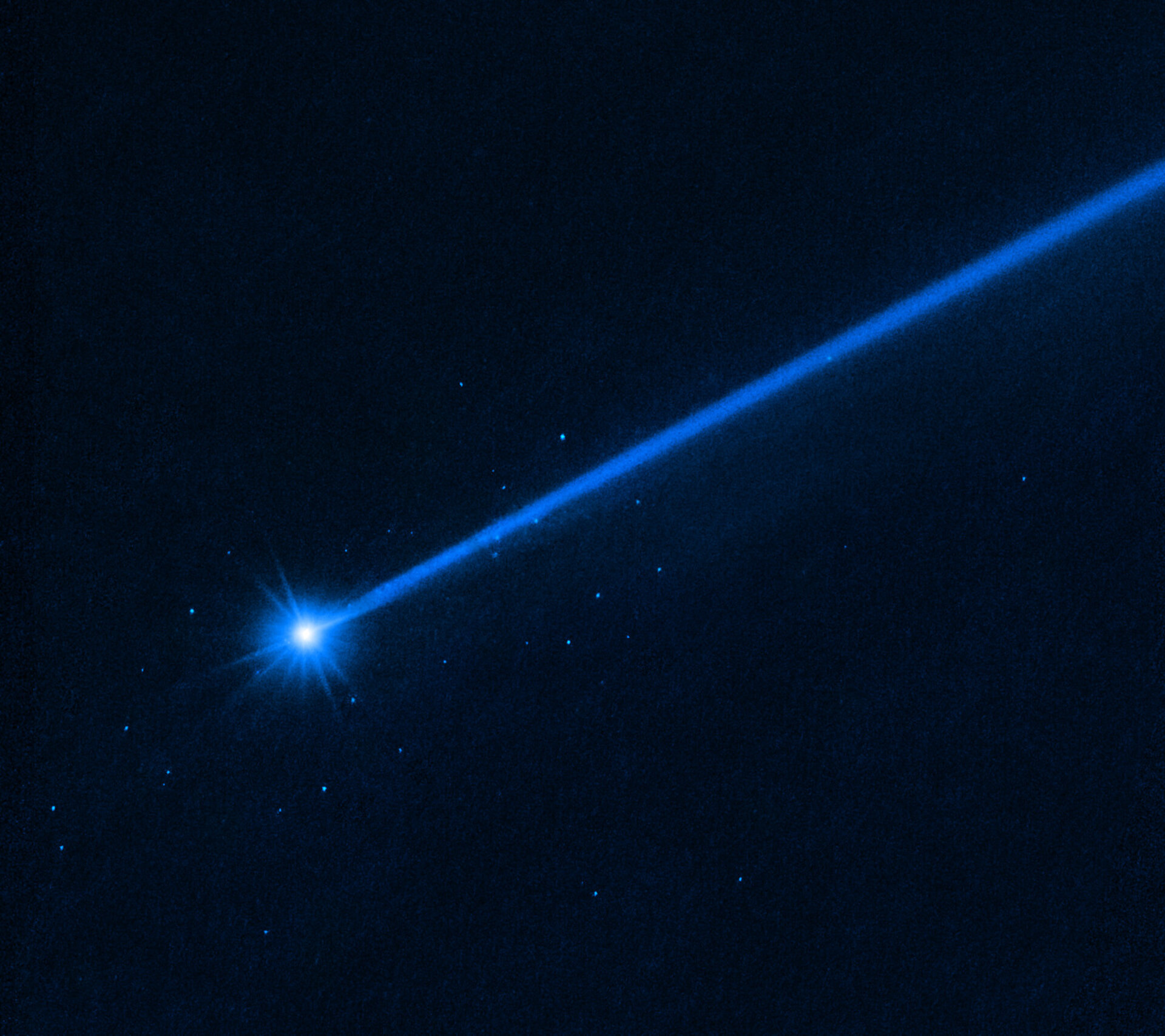 Hubble vidí kameny unikající z asteroidu Dimorphos