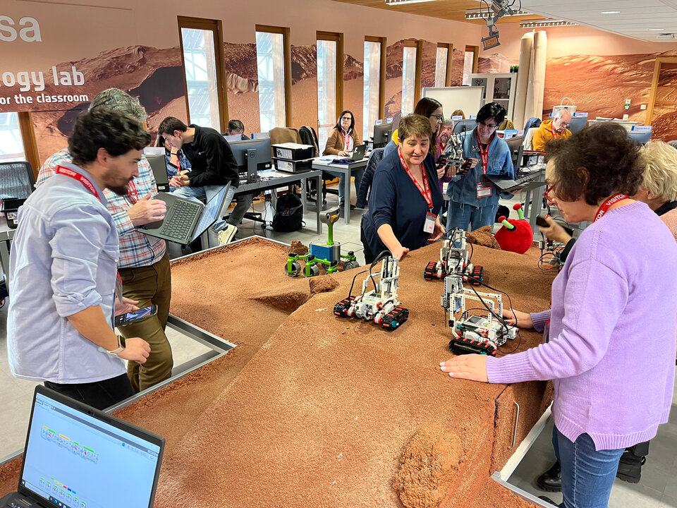 Teachers programming rovers to explore the surface of planet Mars