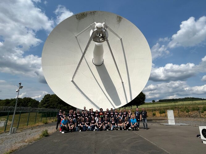 University students and trainers visiting the 20m L-band IOT antenna of Galileo at ESEC