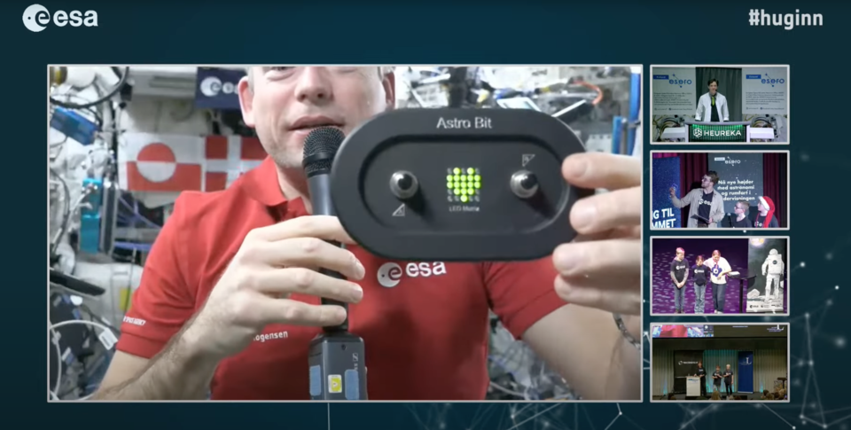 Andreas Mogensen showing the Astro Bit hardware during the call. 