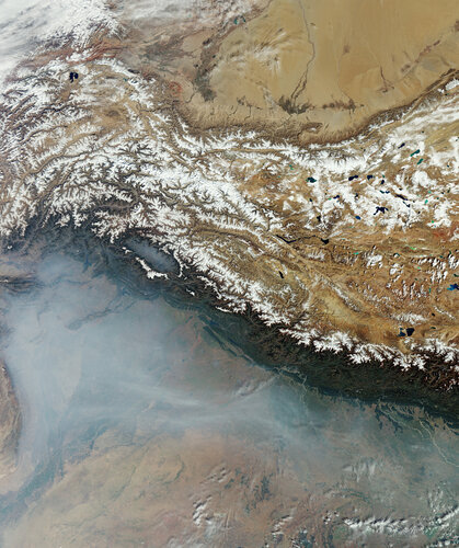 This Copernicus Sentinel-3 image from October 2023 captures the plains of northern India and Pakistan under a white veil of haze and smoke.