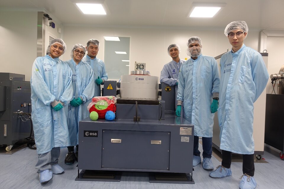 UBC-SFU CubeSat Team (and Paxi!) ready to run the vibration test