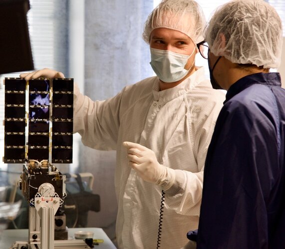 CURIE in cleanroom with students