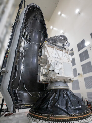 ESA’s EarthCARE satellite being encapsulated within the rocket fairing