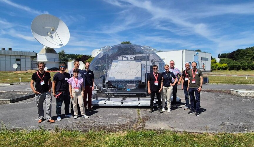 Engineers with newly developed phased array antenna